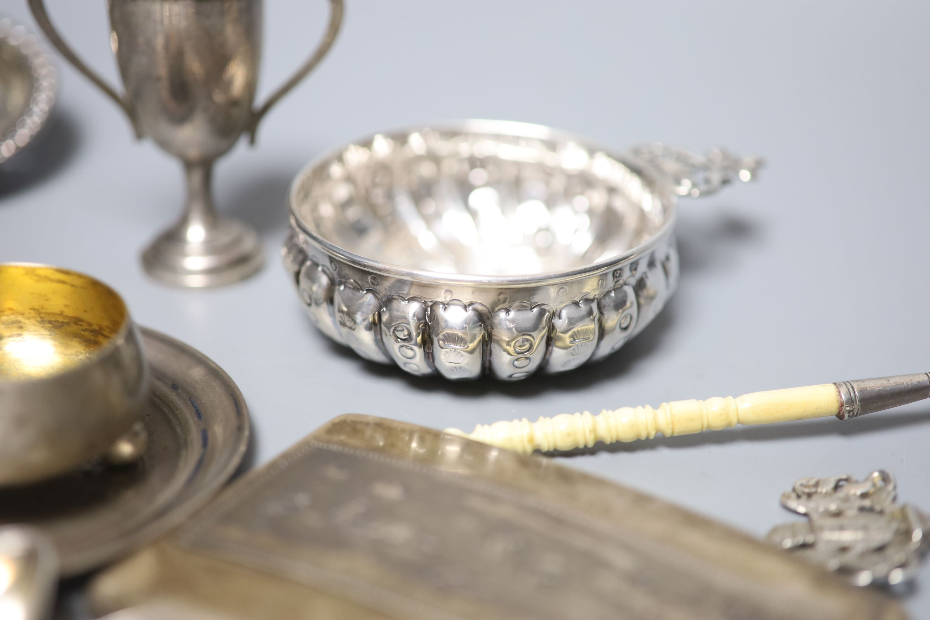A George V silver sifter spoon and a quantity of assorted white metal items, including a Tiffany & Co sterling salt, a Swedish sifter ladle, sterling & enamel coffee spoons, etc.